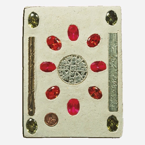 12 precious gemstones, and 2 solid Silver Yantra Foil Takrut Magic spells are inserted into the rear face of the amulet